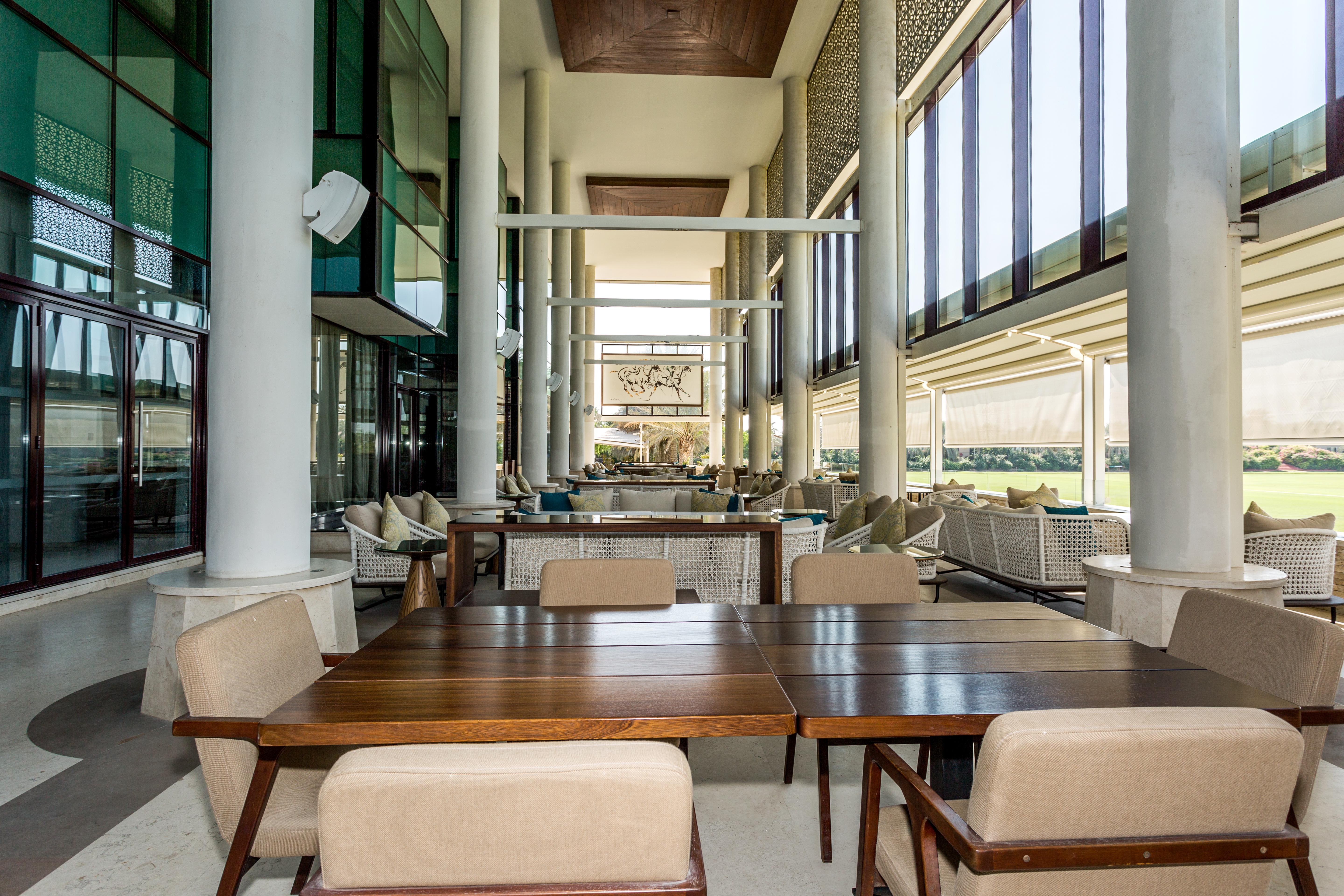Melia Desert Palm Member Of Melia Collection Дубай Экстерьер фото The interior of the clubhouse at the Abu Dhabi Golf Course